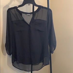 Black long sleeve top.
